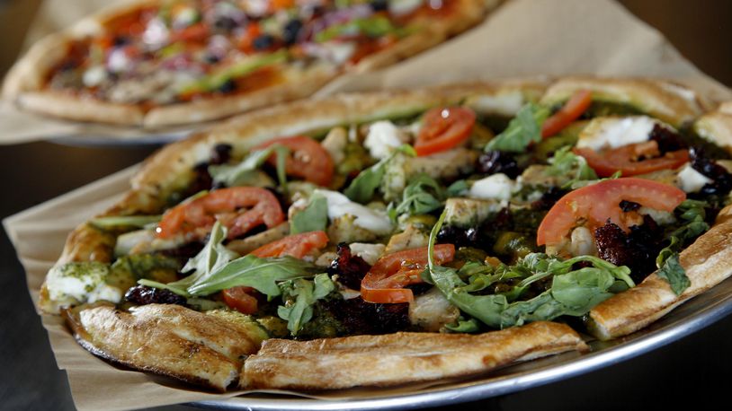 Rapid Fired Pizza is a Kettering-based pizza chain that serves fresh-made pizza in just 180 seconds. Rapid Fired Pizza will be one of the first tenants at a new development being built in Fairfield. STAFF FILE/2015