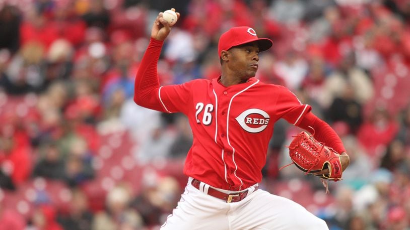 Reds closer Raisel Iglesias pitches against the Cubs on Monday, April 2, 2018, at Great American Ball Park in Cincinnati.