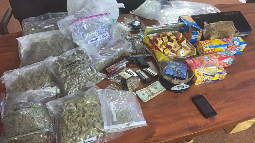 The Butler County Sheriff's Office's Butler County Undercover Regional Narcotics Taskforce (BURN) arrested two men following a search of two Hamilton homes. The BURN unit seized three handguns, approximately 40 THC candy-like edibles, and 8.45 pounds of marijuana, along with approximately $22,000 in cash. CONTRIBUTED