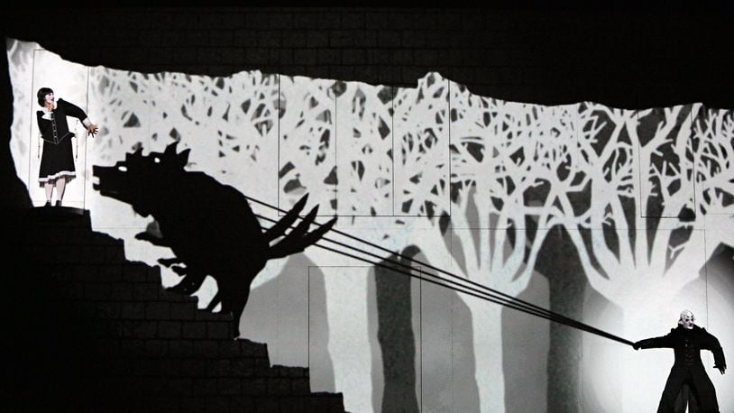 In this re-imagined version of Mozart’s “The Magic Flute,” opening at the Aronoff Center on July 15, a silent movie-style video projection backdrops the performers. CONTRIBUTED