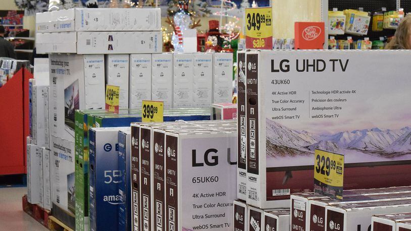 Several stores are offering deals on large televisions. STAFF PHOTO / HOLLY SHIVELY