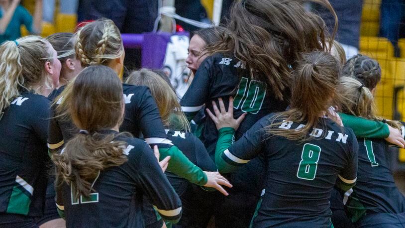 Badin celebrates its first trip to the Division II regional final after upsetting unbeaten Fenwick in five sets Thursday night at Vandalia Butler High School. Jeff Gilbert/CONTRIBUTED
