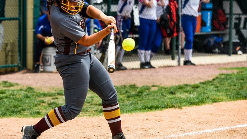 Ally Ivey of Ross connects for a hit during a Division II district final against Clinton-Massie on May 19, 2017, at Mason. The Falcons won 20-5. NICK GRAHAM/STAFF