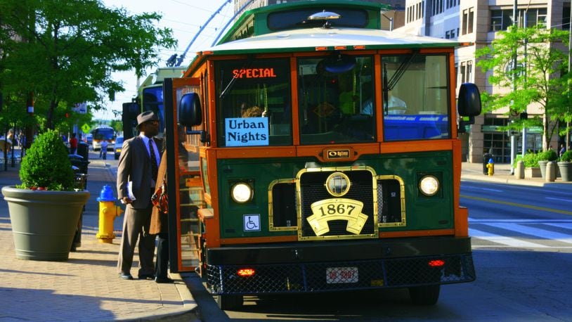 A couple that is moving to Hamilton from Florida is planning to offer a trolley service — not on tracks, but on tires — for fun tours and rides through the city. Pictured is a Dayton area trolley. FILE PHOTO