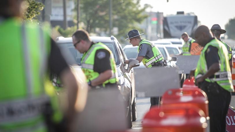 The Dayton Post of the Ohio State Highway Patrol in conjunction with the Montgomery County OVI Task Force conducted an OVI checkpoint on U.S. 35 west at state Route 49 in July 2019. STAFF
