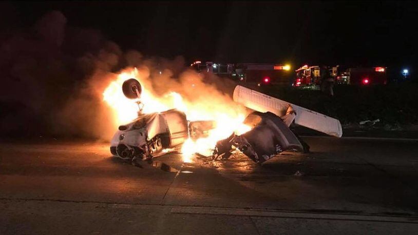 A single-engine plane crashed and caught fire on a California highway near Modesto on Friday night.