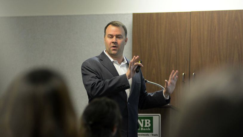 Ohio Democratic Party Chairman David Pepper talks on Tuesday night with the Butler County Progressives PAC about what needs to happen in 2018 for the party to win statewide and in congressional mid-term elections in uptown Oxford.