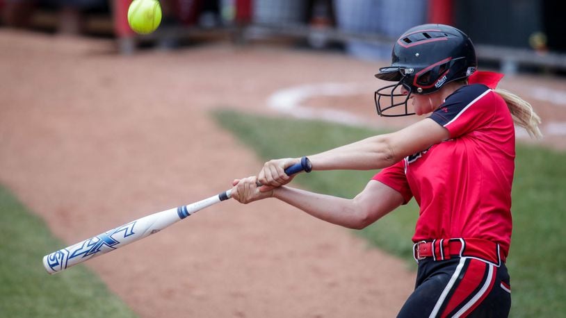 Lakota West’s Alyssa Triner gets a piece of the ball during the Division I state final against Massillon Perry on June 2 at Firestone Stadium in Akron. NICK GRAHAM/STAFF
