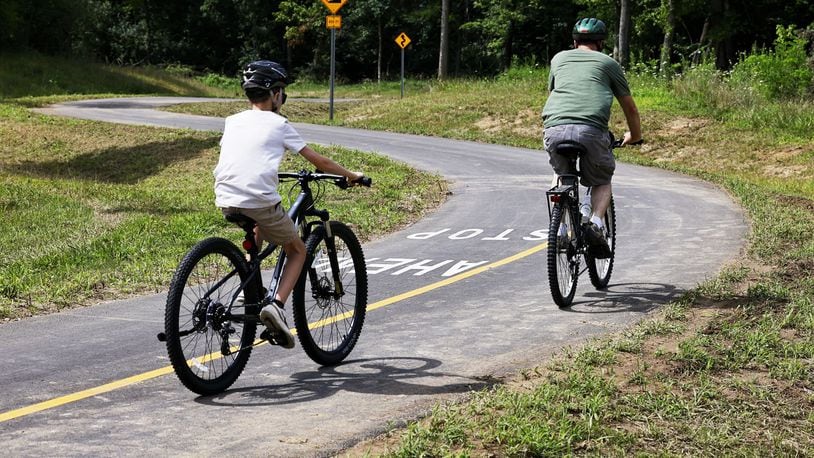 The Great Miami River Trail Timberhill extension opened Friday, Aug. 12, 2022. The trail extended through to the Rentschler Forest MetroPark Timberhill area. NICK GRAHAM/STAFF
