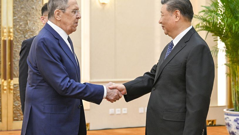 In this photo released by Xinhua News Agency, Russian Foreign Minister Sergey Lavrov, left, and Chinese President Xi Jinping meets at the Great Hall of the People in Beijing on April 9, 2024. China has surged sales to Russia of machine tools, microelectronics and other technology that Moscow in turn is using to produce missiles, tanks, aircraft and other weaponry. That's according to two senior Biden administration officials who discussed the sensitive findings on the condition of anonymity. Russia's microelectronics came from China, which Russia has used missiles, tanks and aircraft. (Li Xueren/Xinhua via AP)