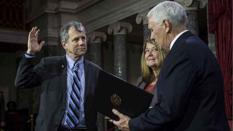 WASHINGTON, DC - Sen. Sherrod Brown (D-OHIO) participates in a mock swearing-in ceremony with Vice President Mike Pence on Capitol Hill on January 3, 2019, in Washington. (Photo by Zach Gibson/Getty Images)