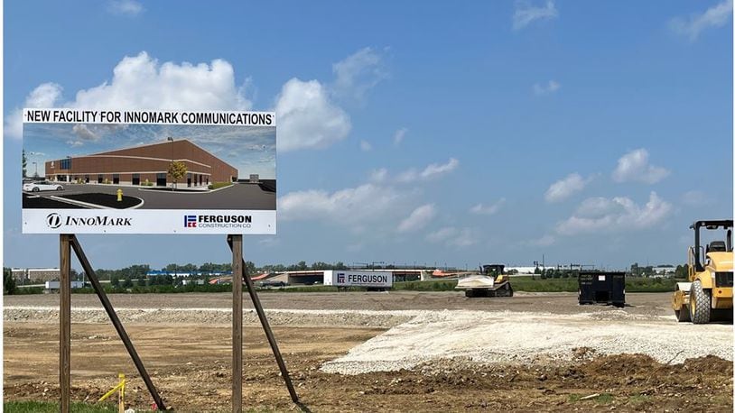Heavy equipment is working to prepare the site for the new Innomark Communications digital printing facility on South Tech Boulevard in Springboro. The new $10 million, 96,480 square-foot building is expected to be completed during the third quarter of 2024. ED RICHTER/STAFF