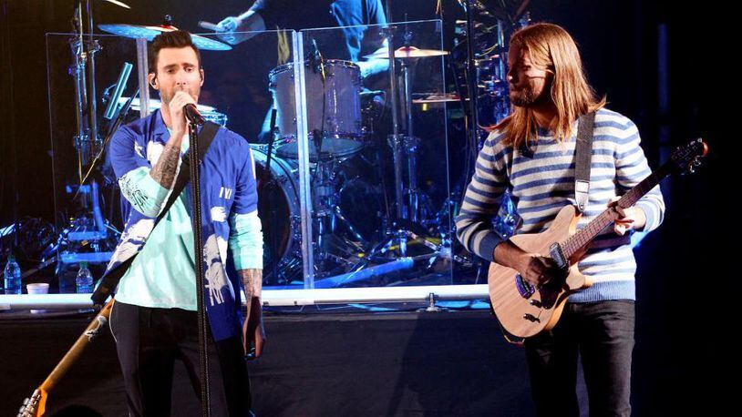 Adam Levine (L) and James Valentine of Maroon 5 busked in a NYC subway with Jimmy Fallon (not pictured) on "The Tonight Show."