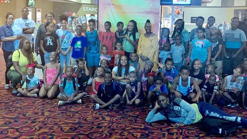 A hundred local children and 34 adult chaperons attended a free screening of "The Lion King."  The event was part of a partnership between Dayton Young Black Professionals,  McKinley United Methodist Church, The Dayton Foundation, CityWide Development Corporation and the Gem City Market.