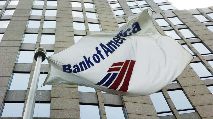 A flag flies outside the Bank of America Corporate Center on June 30, 2005, in downtown Charlotte, North Carolina.