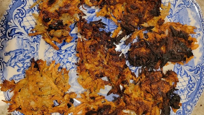 Because the small amount of oil miraculously burned for eight days, traditional Hanukkah foods are oil-based. The most distinctive dish is potato latke. CONTRIBUTED
