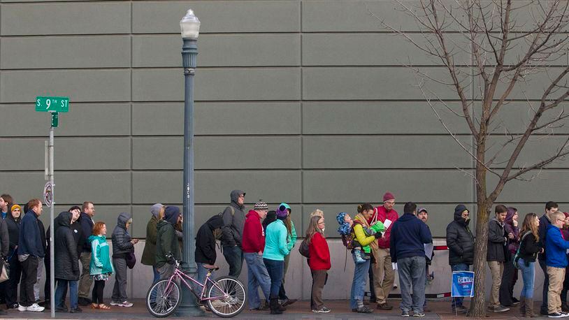 People wait in line for the county-wide Democratic caucus in Boise, Idaho, Tuesday, March 22, 2016. (AP Photo/Otto Kitsinger)