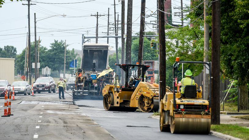 Middletown City Council will hold a public hearing at 5:30 p.m. Tuesday about a proposed 10-year, 0.25% income tax increase to be placed on the Nov. 3 general election ballot. If approved, it would add about $3 million a year for street and road repair and paving. FILE PHOTO



Paving crews will be busy in 2018 as Middletown is planning to spend about $2.35 million paving streets. FILE PHOTO