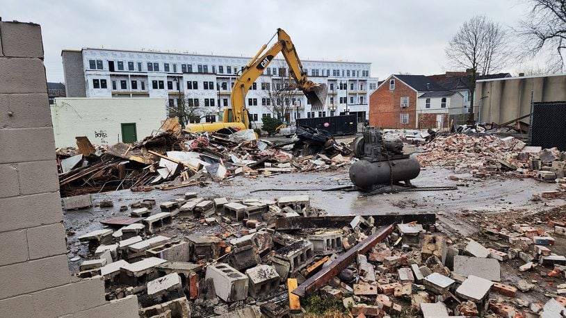 Demolition at the rear of the Main Street property in Hamilton that will eventually be an Agave & Rye restaurant has started. NICK GRAHAM/STAFF