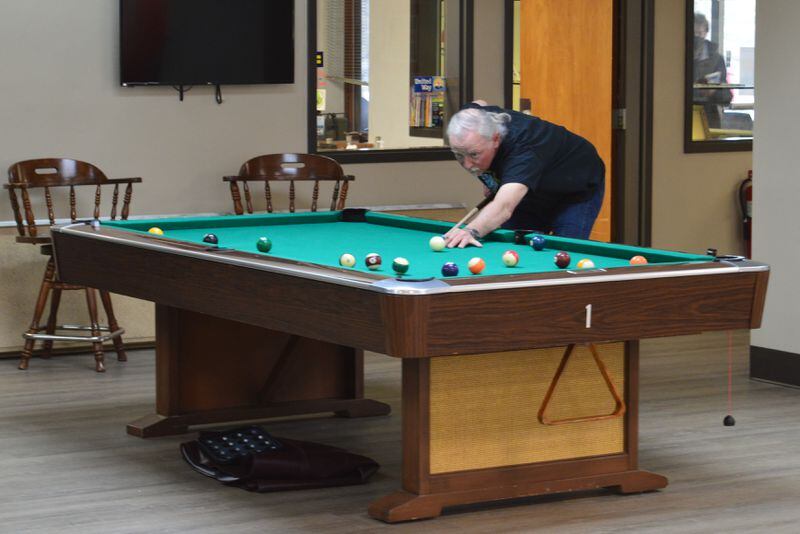 The pool tables remain a popular attraction at the Oxford Senior Center with players turning up several days a week to play.  CONTRIBUTE/BOB RATTERMAN