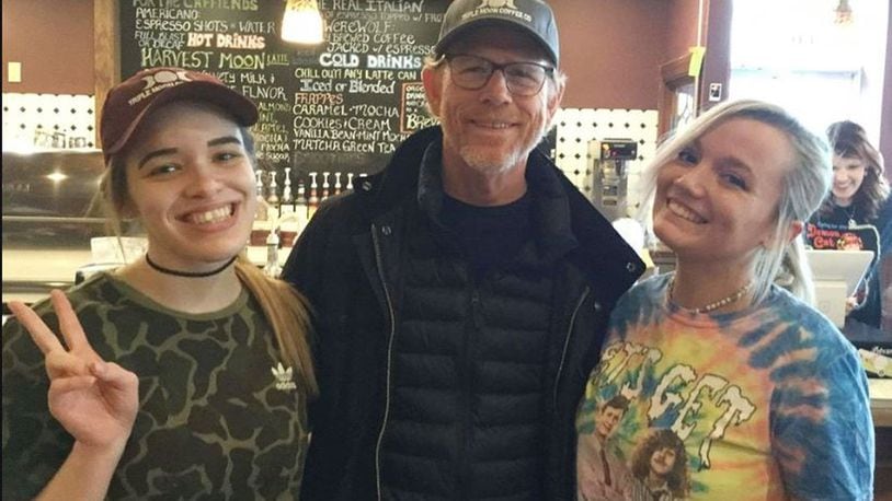 Academy Award-winning director Ron Howard poses with Triple Moon Coffee Company employees during a stop for latte earlier this year. The employees said that Howard is becoming a regular at the downtown Middletown coffee house. Howard and his production crew will be in Middletown for a few days next month to film “Hillbilly Elegy.” CONTRIBUTED.
