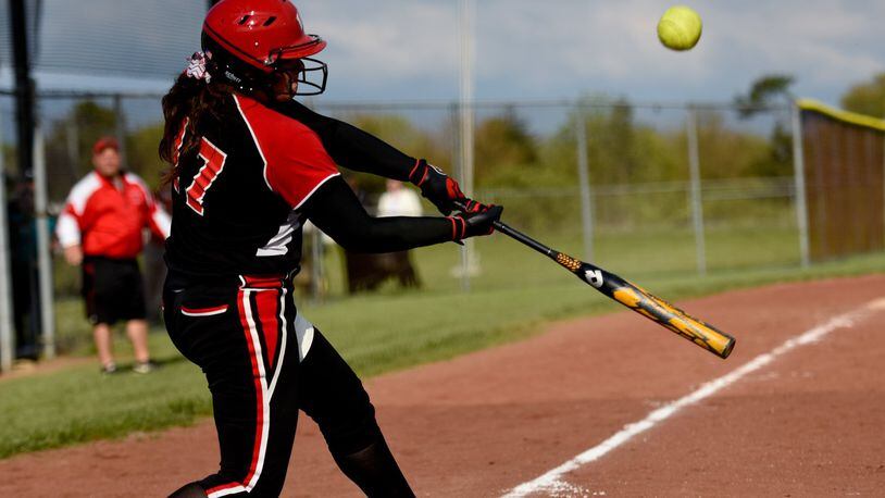 Lakota West’s Marisa Brown connects with the ball during a 20-8 win at Lakota East on April 30, 2015. NICK GRAHAM/STAFF