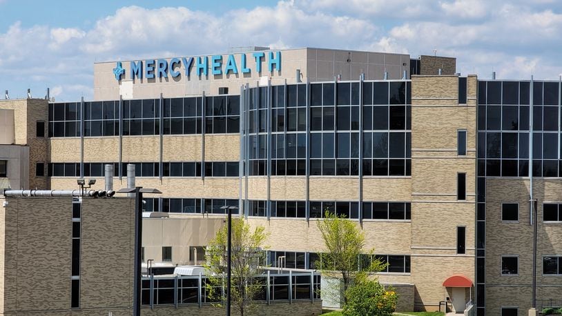 Mercy Health Cincinnati may delay non-emergency and elective surgeries as cases of COVID-19 spike. A hospital spokeswoman said patients will be contacted on a case-by-case basis. NICK GRAHAM/STAFF