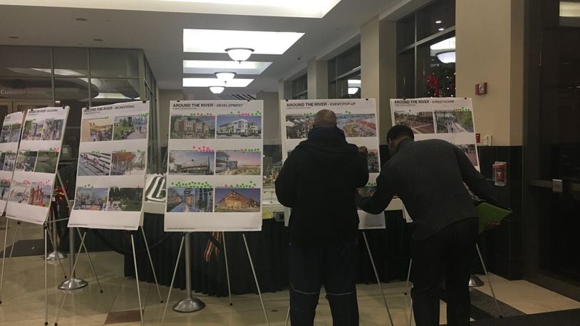 Hamilton residents gave their opinions Wednesday about ideas for the River District Master Plan, which will guide how the city develops along its riverfront. MIKE RUTLEDGE/STAFF