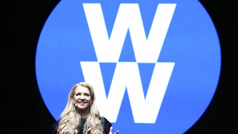 Weight Watchers President and Chief Executive Officer Mindy Grossman speaks at a global employee event in New York. Weight Watchers says it is renaming itself to WW to focus more on overall wellness and not just dieting. (Amy Sussman/AP Images for Weight Watchers, File)