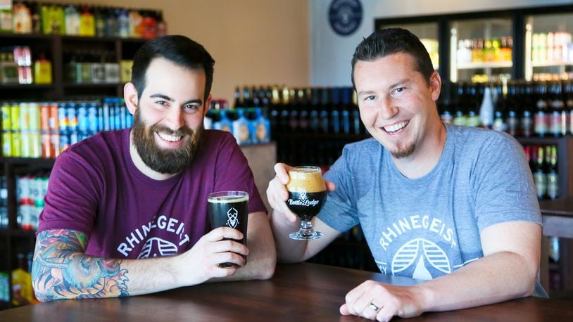 Caleb Colbert and Brian Brownlow are craft-beer enthusiasts who were frustrated about the lack of a craft-beer store in the region and opened BC's Bottle Lodge, a combination lounge and retail store that recently opened at 7121 Liberty Centre Drive, Liberty Twp. GREG LYNCH / STAFF