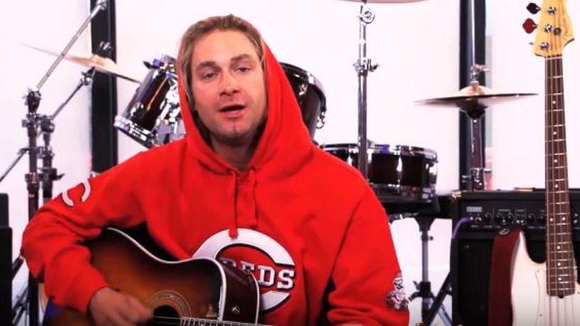 Bronson Arroyo, here playing a song for the MLB Fan Cave, was almost as well known for his guitar work as he was pitching during his time with the Reds.
