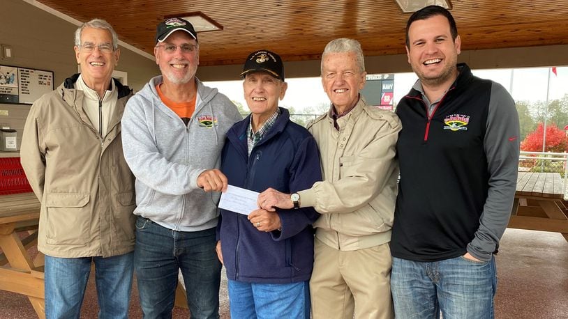 The Hamilton High class of 1954 donated on Oct. 29, 2021, the balance of its funds, $1,500, to the Nuxhall Foundation. Pictured, from left, are Nuxhall Foundation Vice Chairman Larry Tischler, Nuxhall Foundation Volunteer CEO Kim Nuxhall, Class of 1954 member Russ Moore, Class of 1954 member Bernie Jones, and Nuxhall Foundation Executive Director Tyler Bradshaw. MICHAEL D. PITMAN/STAFF