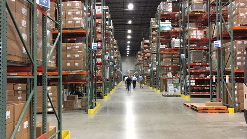 Besides Miamisburg’s 200,000-square-foot distribution center, seen here, Winsupply has similar centers in Middletown, Conn., Aurora, Colo. and in Prince George, Va. THOMAS GNAU/STAFF
