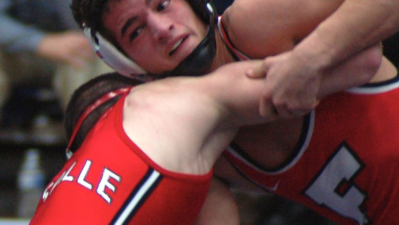 Fairfield’s Zach Shupp looks for an opening to attack La Salle’s Lucas Byrd during their 106-pound title match at the Division I district tournament at Fairmont’s Trent Arena last season. CONTRIBUTED PHOTO BY JOHN CUMMINGS