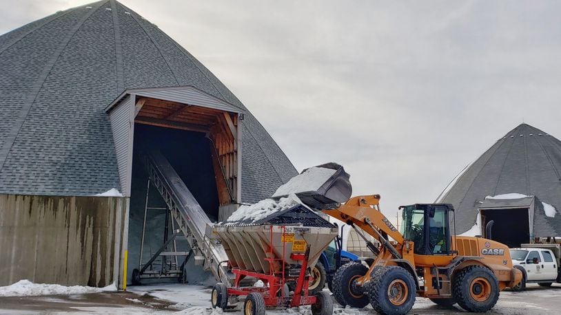Crews at the Butler County Engineer’s Office clean plow trucks and replenish the salt supply Tuesday, Jan. 22 after two weekends of snow events in the area. NICK GRAHAM/STAFF