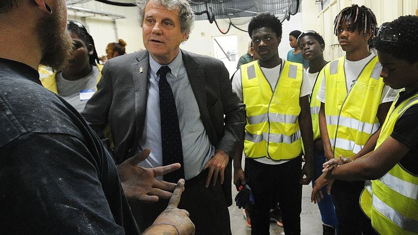 Senator Sherrod Brown talks with instructors and students at the Dayton Buildings Trades Construction Camp Thursday June  29, 2023 held at the IBEW Local 82 Hall. MARSHALL GORBY\STAFF
