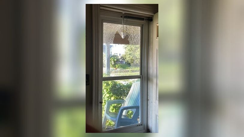 A Hamilton home shows where a bullet hit the front door. CONTRIBUTED
