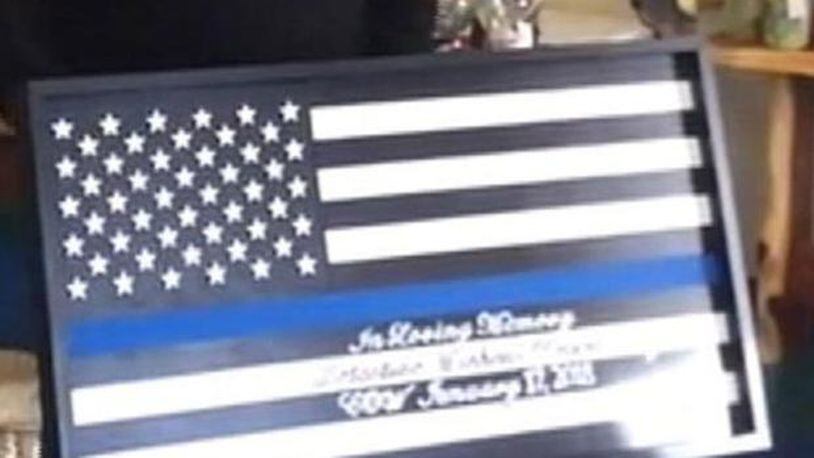 A flag was made to honor the memory of Detective. Mike Doty.