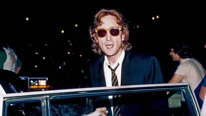 Former Beatle John Lennon arrives at the Times Square recording studio 'The Hit Factory' before a recording session of his final album 'Double Fanasy' in August 1980 in New York City, New York. (Photo by Vinnie Zuffante/Michael Ochs Archives/Getty Images)