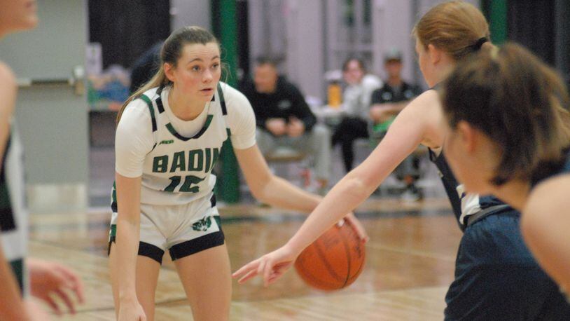 Badin's Gracie Cosgrove (15) looks for a passing lane against St. Ursula earlier this season. Chris Vogt/CONTRIBUTED