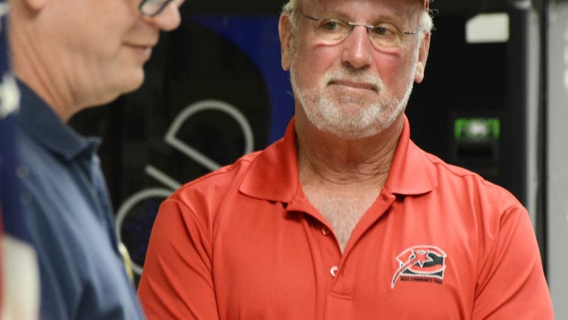 Kim Nuxhall received $9,000 from the Fairfield Optimist Club, Fairfield Community Foundation and Hamilton Community Foundation on Thursday, Sept. 26, 2019, which was also Nuxhall Night at the Optimist Club. Pictured is Nuxhall reacting to receiving the money to continue the legacy of his father, Cincinnati Reds Hall of Fame pitcher and announcer Joe Nuxhall, who died in November 2007. MICHAEL D. PITMAN/STAFF