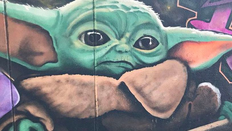 Two artists have brought Baby Yoda, the adorable character from Disney+'s new "Star" Wars franchise, "The Mandalorian,"to life in a new mural (WSBTV.com)