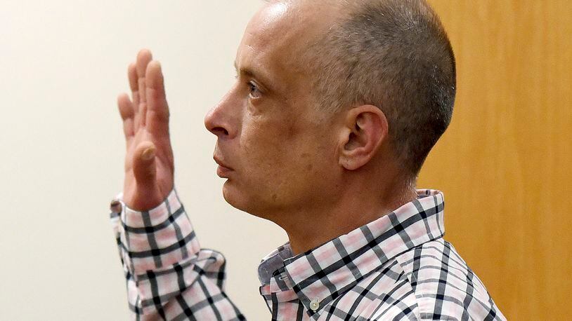 Youth Development Center plaintiff David Meehan gets sworn in before giving testimony in his civil trial at Rockingham County Superior Court in Brentwood, N.H. on Wednesday, April 17, 2024. (David Lane/Union Leader via AP, Pool)
