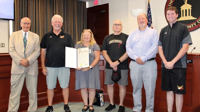 Hamilton Mayor Pat Moeller (left) poses with Hamilton Joes staff during honorary recognition at August 10 council meeting. PEARL ZAJBEL/CONTRIBUTED