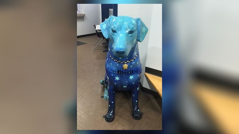 This large artistic dog was donated to Middletown police by Middletown grad and Chicago Cub Kyle Schwarber. It now sits in the lobby. MIDDLETOWN DIVISION OF POLICE