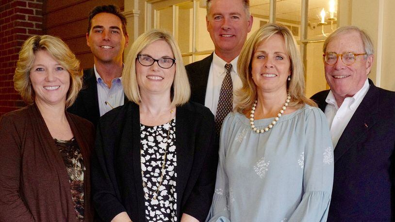 The Beaton and Fey insurance firms are merging to form Fey Bruder Insurance Advisors. Pictured, front, from left are Michelle Garrett, Holly Bruder, Elizabeth Fey Mundy and Tom Fey. Back row, Brian Fey and Matt Green. CONTRIBUTED