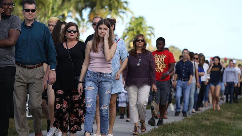 Students and parents returned to Marjory Stoneman Douglas High School on Sunday for an orientation session. It was the first time students were allowed on campus since the mass shooting on Feb. 14.