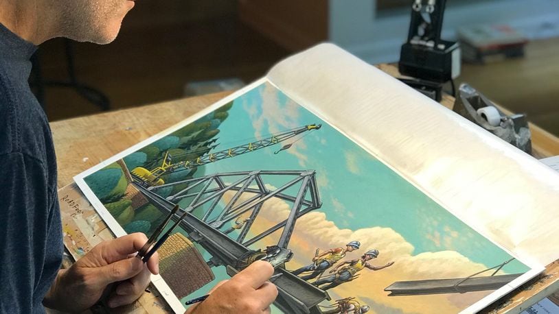 Loren Long, an illustrator with Butler County ties, worked on a book of poems written by National Youth Poet Laureate Amanda Gorman. Here he works on his latest book, “Someone Builds the Dream,” by Lisa Wheeler. SUBMITTED PHOTO