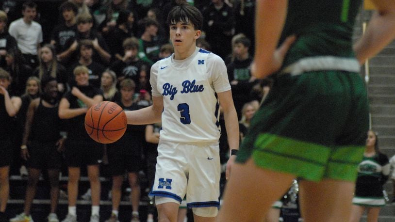 Hamilton's Cooper Matthews scored a game-high 20 points Saturday to lift the Big Blue past Badin in the season opener for both teams. Chris Vogt/CONTRIBUTED