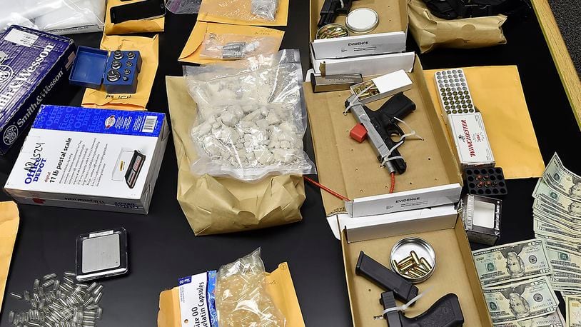 More than $120,000 of heroin was seized from a Bethel Twp. home by the Clark County Sheriff’s Office in 2014. BILL LACKEY / STAFF